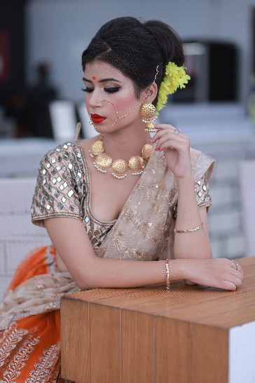 Orange Bridal Lehenga with Heavy Embroidered Dupatta & Silver Blouse