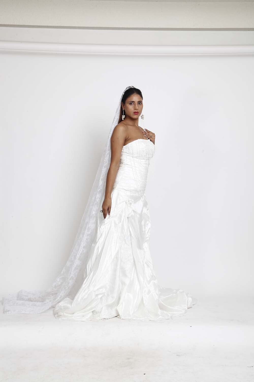 White Strapless Bridal Gown with Ruched Detailing